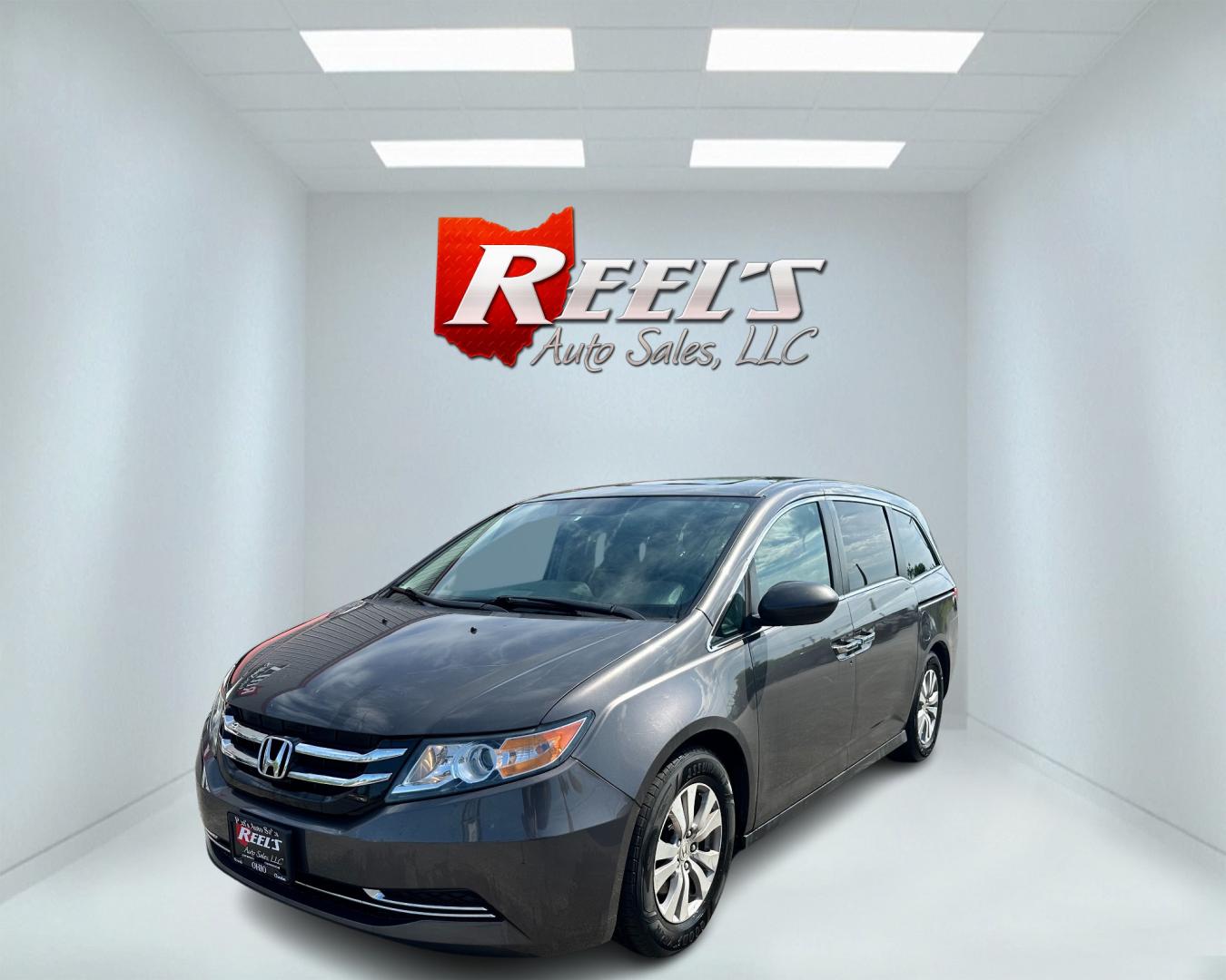 2015 Gray /Grey Honda Odyssey EX-L (5FNRL5H67FB) with an 3.5L V6 SOHC 24V engine, 6-Speed Automatic transmission, located at 547 E. Main St., Orwell, OH, 44076, (440) 437-5893, 41.535435, -80.847855 - Photo#0